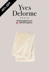 Palais Royal Linen Gallery Frisson Throw in soft, textured fabric with a cozy, stylish appearance for living room or bedroom decor.