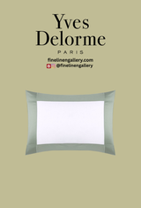 Yves Delorme Apollon Duvet Cover Verones with intricate floral embroidery and elegant design, shown on a neatly made bed.