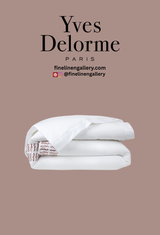 Yves Delorme Dorian duvet cover in sant fabric with elegant, soft linen texture and subtle pattern design.