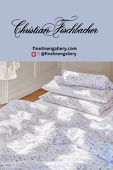 Light blue Florina flat sheet from Palais Royal Linen Gallery, shown flat with smooth fabric and neat edges.
