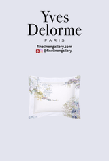 Yves Delorme Lande duvet cover featuring elegant sham design with intricate floral patterns in soft, neutral tones.