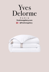 Yves Delorme Linea Triomphe fitted sheet in soft loutre color, featuring elegant linen fabric and refined craftsmanship.