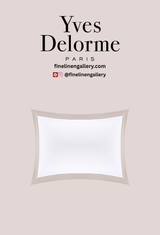 Yves Delorme Linea sham in soft linen with subtle loutre color, featuring elegant stitched detailing for a luxurious bedroom look.
