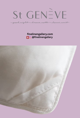 Luxurious silk duvet from St Geneve featuring smooth, shiny silk fabric and plush filling for comfortable, breathable sleep.