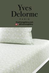 Cream-colored Capri fitted sheet from Palais Royal Linen Gallery, showing smooth, wrinkle-free fabric on a mattress.