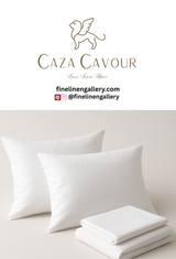 Caza Cavour 400TC Egyptian cotton percale sheet set with hemstitch, folded with two pillows on top, showcasing luxurious bedding.
