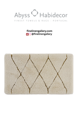Abyss Habidecor Heritage bath rug with intricate woven pattern in soft, plush fabric, suitable for bathroom decor.